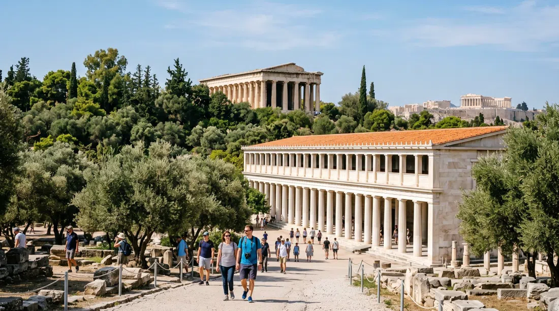 The Ancient Agora with the Temple of Hephaestus rising over olive trees and the Stoa of Attalos colonnade in bright morning light